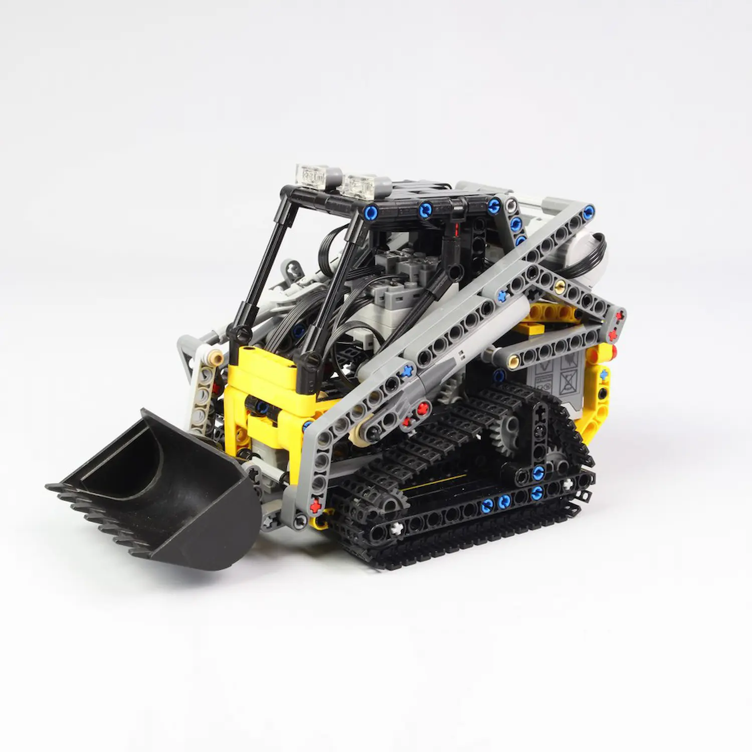 MOC 13349 - RC Technic Compact Tracked Loader(LEGO Alternative Bricks) in grey background